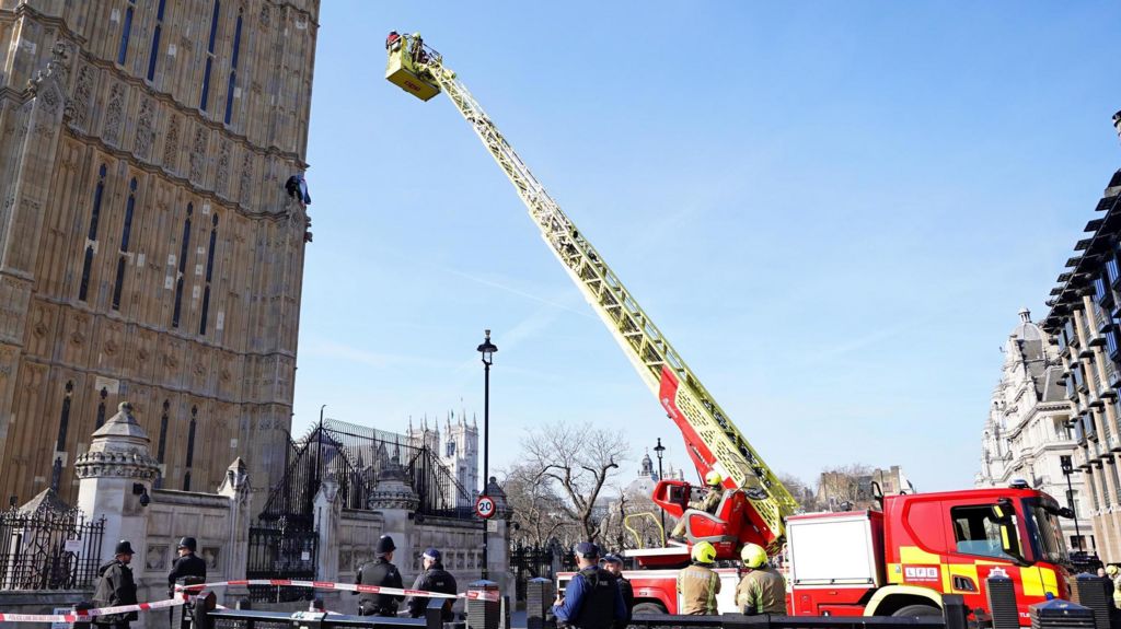 Emergency services including a fire engine with an extendable ladder at the Palace of Westminster in London after a man with a Palestine flag climbed up Elizabeth Tower.