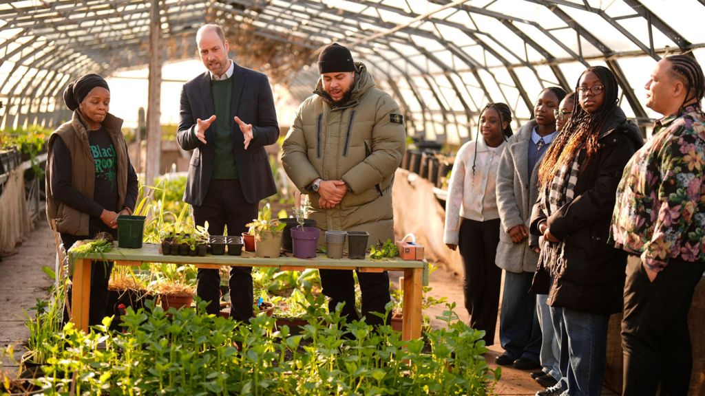 From left, Paulette Henry from Black Rootz, the Prince of Wales and Big Zuu with young people from the Humber All Nations Alliance