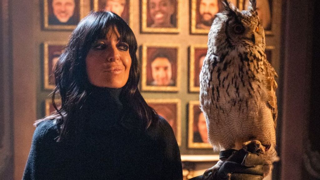 Claudia Winkleman in the Traitors castle with an owl
