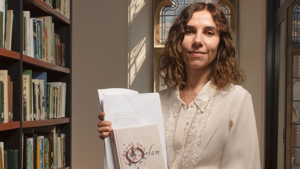 PJ Harvey with the copy of Orlam, the poem written in the Dorset dialect