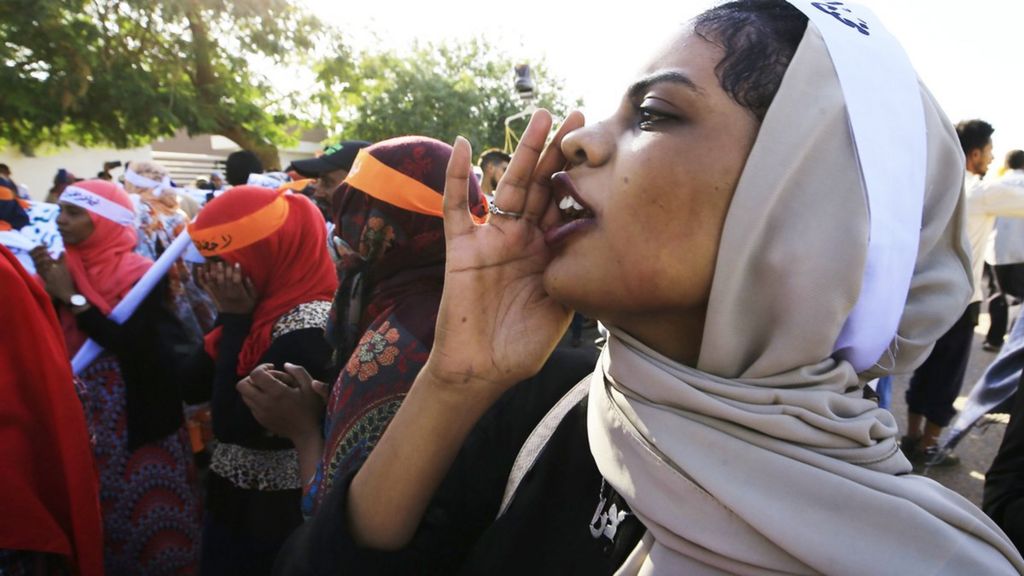 Sudanese woman chanting during a march in Khartoum marking International Day for Eliminating Violence Against Women