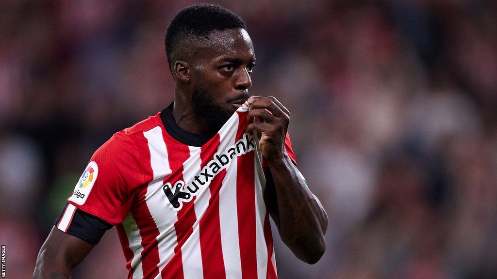 Inaki Williams kisses the club badge after scoring for Athletic Bilbao
