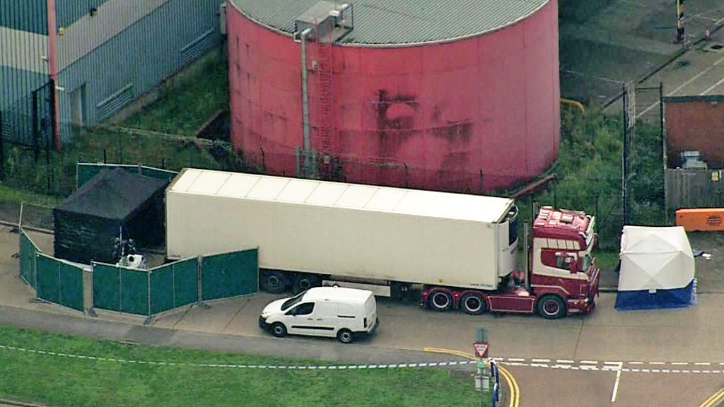 The bodies of 39 people are found in a lorry container on an industrial park in Essex.