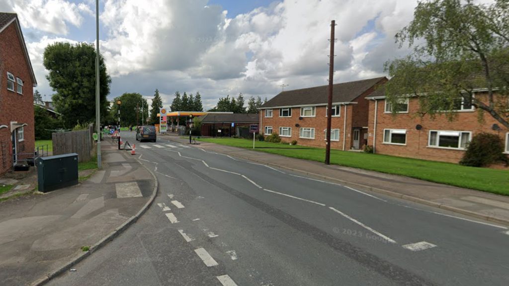 A Google street view of Painswick Road in Gloucester showing houses each side and green areas