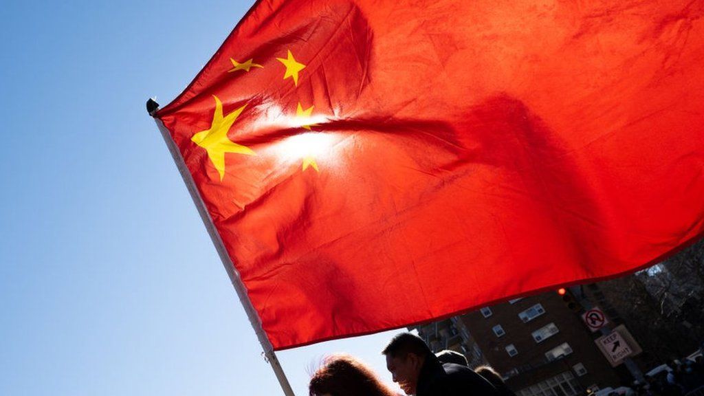 China flag against the blue sky