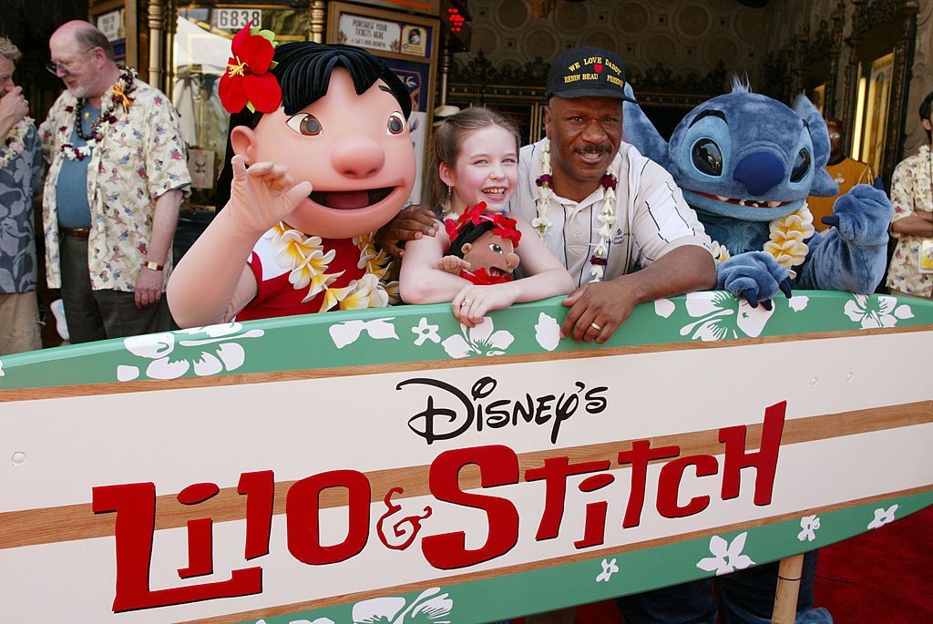 Daveigh Chase, voice of Lilo and Ving Rhames, voice of Cobra Bubbles, at the premiere and after-party for Lilo & Stitch at the El Capitan Theatre in Los Angeles on 16 June 2002.
