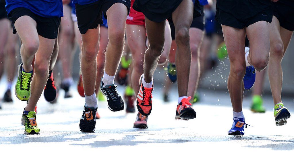 Runners start a marathon
