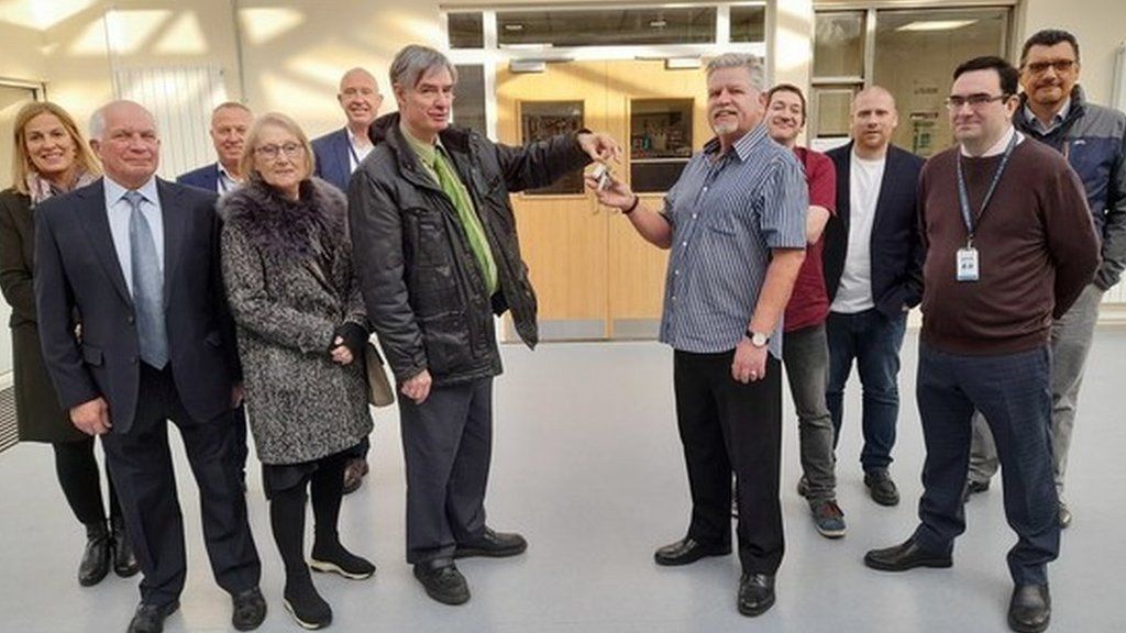 Leader of Basildon Council, Cllr Andrew Baggott (left) handing over the keys to the newly refurbished Laindon Community Centre to Chairman of the Committee, David Kerr.
