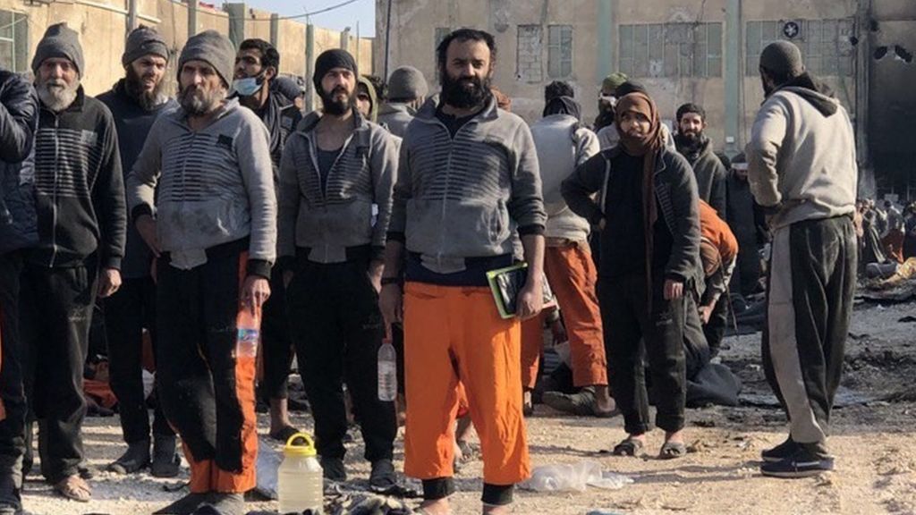 Photograph posted by SDF spokesman Farhad Shami showing suspected IS militants surrendering at Ghwayran prison in Hasaka, Syria (26 January 2022)