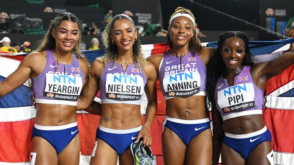 Nicole Yeargin, Laviai Nielsen, Amber Anning, and Ama Pipi after claiming bronze in the 4x400m relay at the World Athletics Championships in 2023