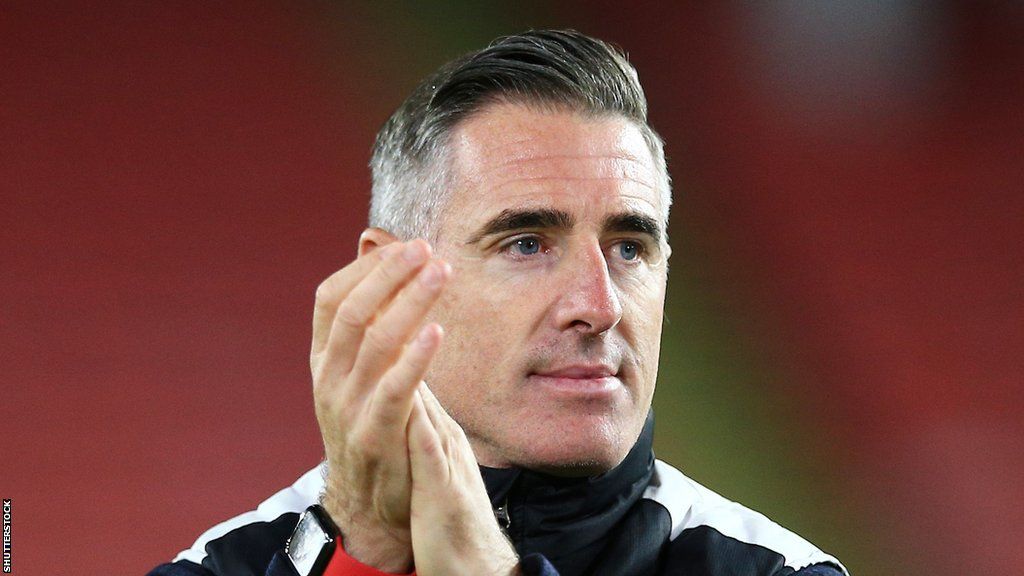 Lincoln manager Mark Kennedy thanks fans after the Carabao Cup tie between Sheffield United and Lincoln City