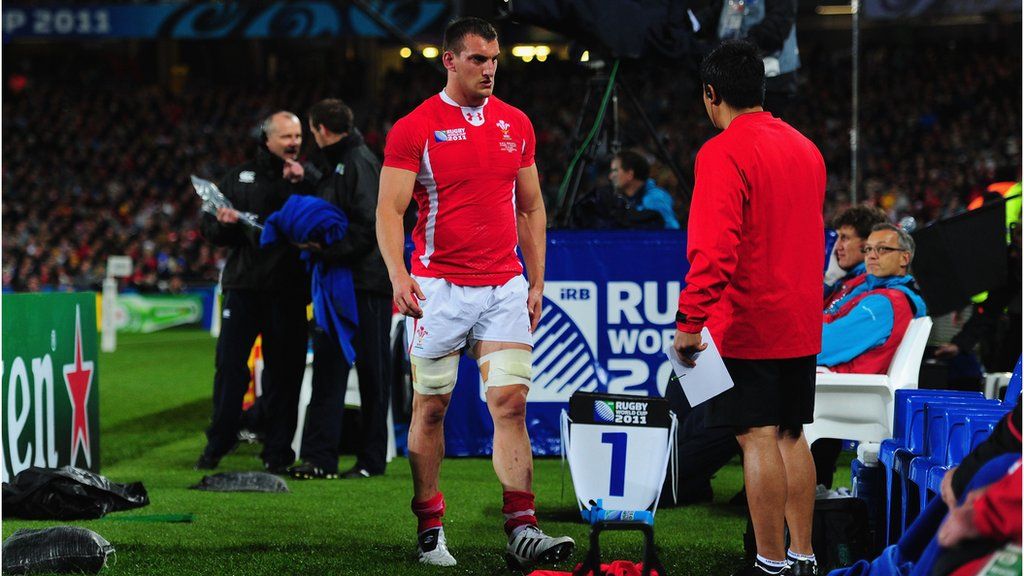 Wales captain Sam Warburton leaves the pitch after receiving a straight red card during their semi final against France at the 2011 Rugby World Cup in New Zealand.