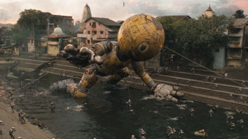 A giant robot character kneeling in a river, surrounded by tiny human figures who have attached three ropes to it
