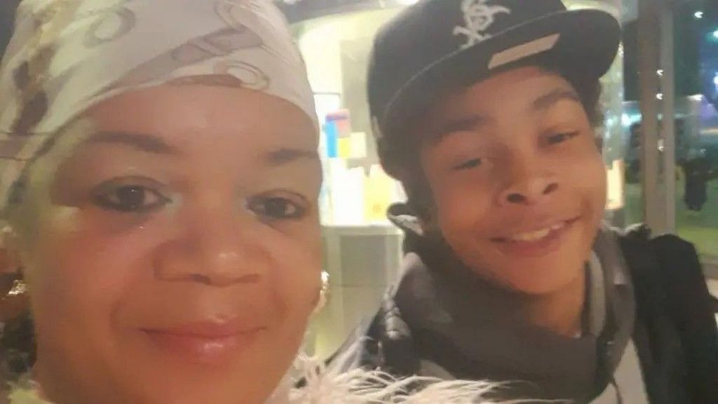 Mary Bokassa is seen in a selfie with her son, Kelyan.