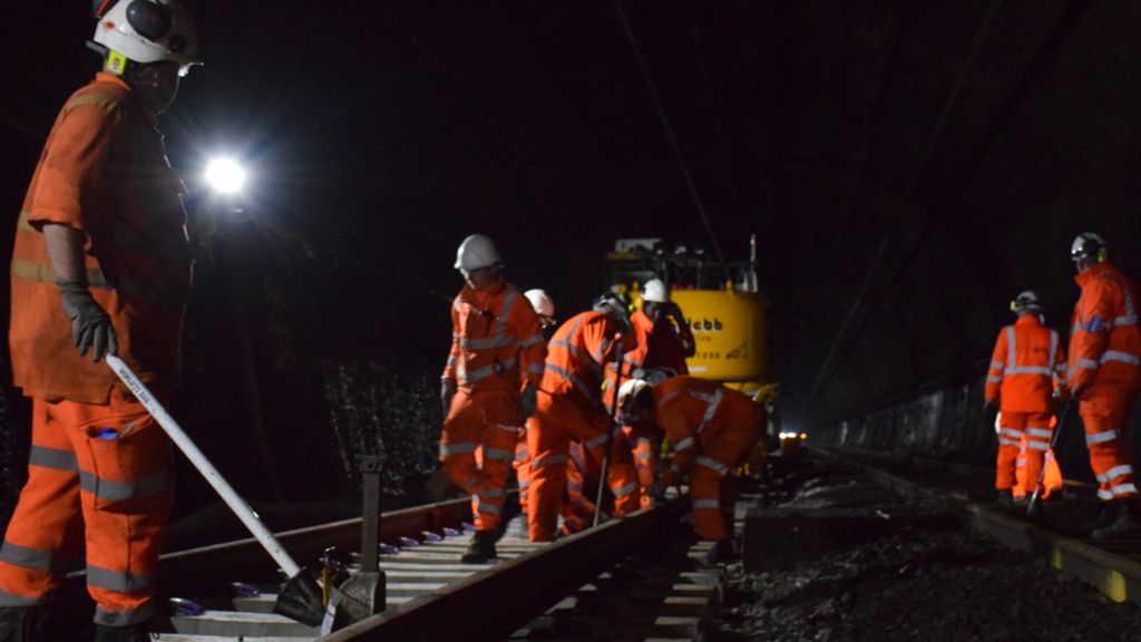 Engineers positioning new track laid in the Severn Tunnel