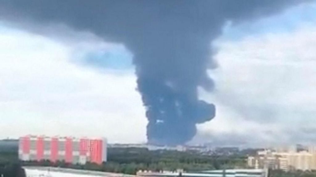 A large plume of smoke rising over Russia