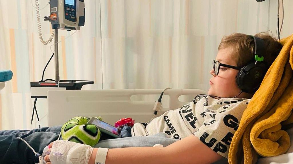 Jakob during an enzyme transfusion in hospital