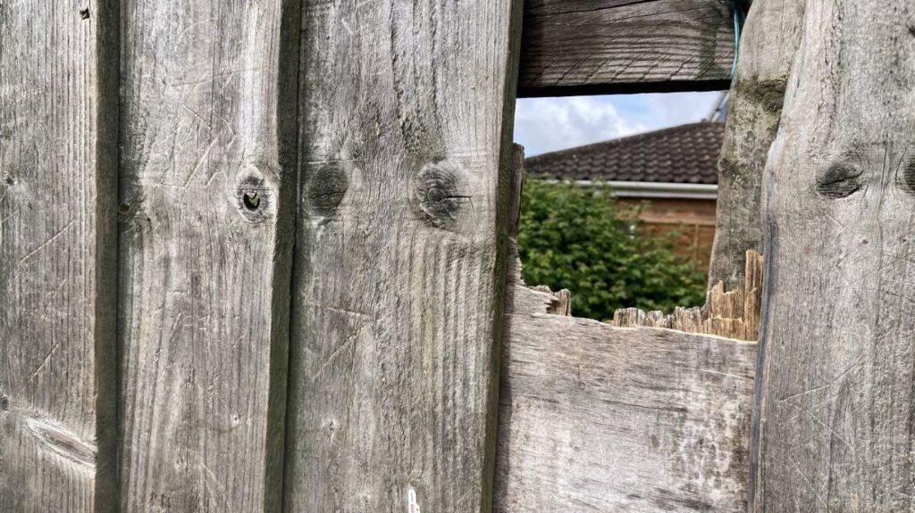 Hole in the fence allegedly used to sell drugs