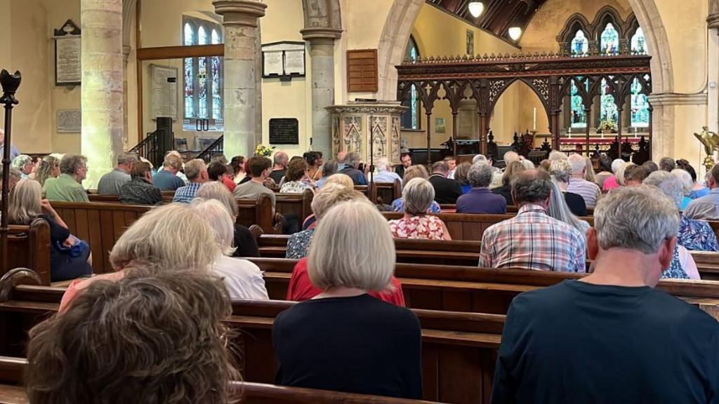 The hustings audience inside St Mary's Church, in Lydney, in the Forest of Dean listening to the candidates speak.