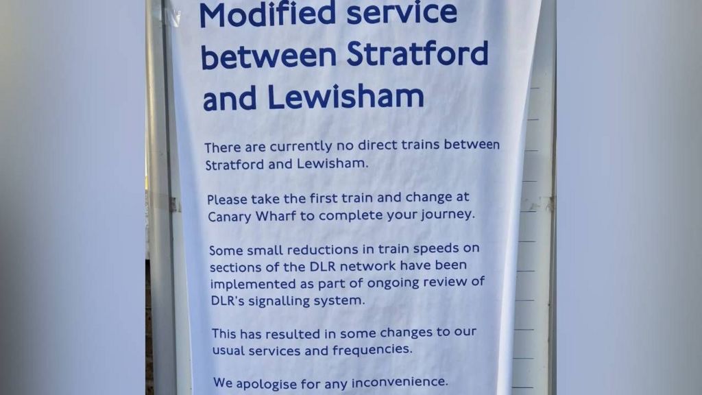 Poster which says: Modified Service between Stratford and Lewisham.
There are currently no direct trains between Stratford and Lewisham. Please take the first train and change at Canary Wharf to complete your journey. Some small reductions in train speeds on sections of the DLR network have been implemented as part of ongoing review of DLR's signalling system. This has resulted in some changes to our usual services and frequencies. We apologise for any inconvenience.