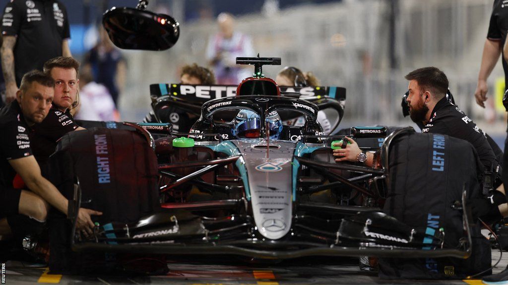 Mercedes check George Russell's car during pre-season testing in Bahrain