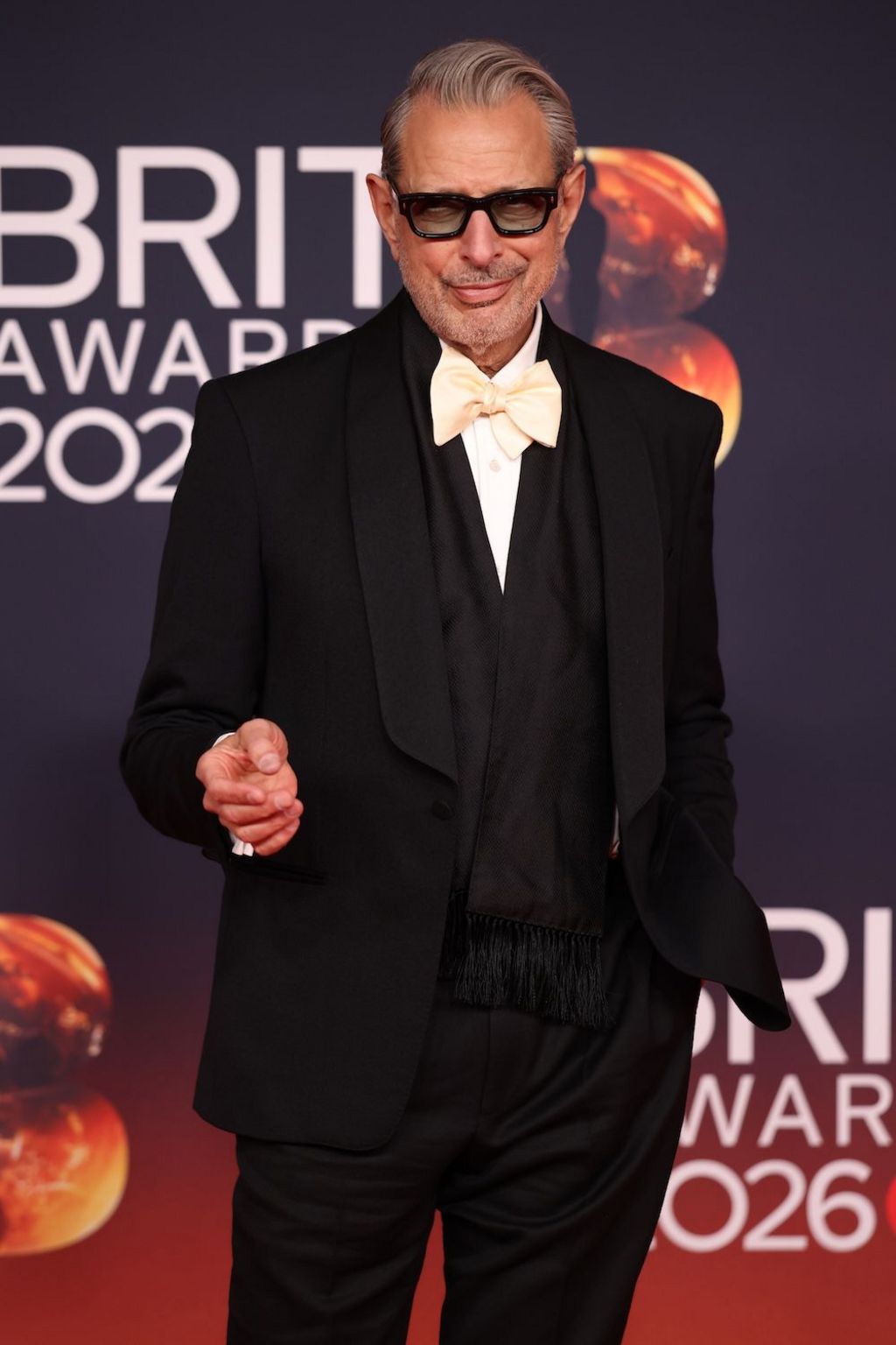 Jeff Goldblum in a tuxedo on the red carpet.