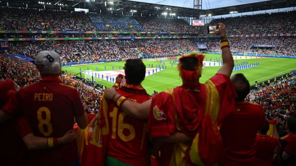 Spain fans cheer on their side at a game during Euro 2024