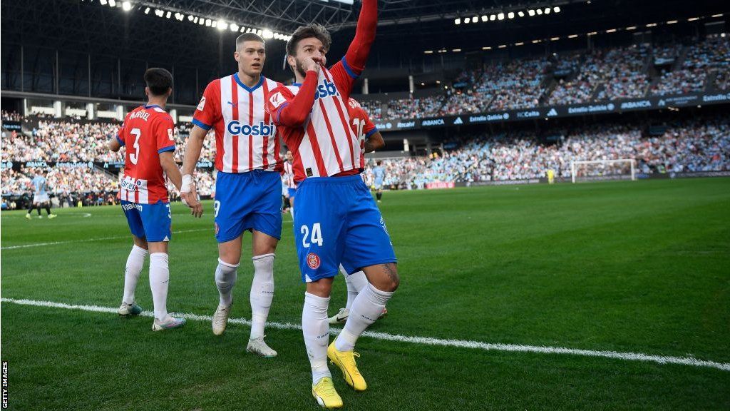 Girona forward Cristian Portugues celebrates after scoring his team's first goal against Celta Vigo
