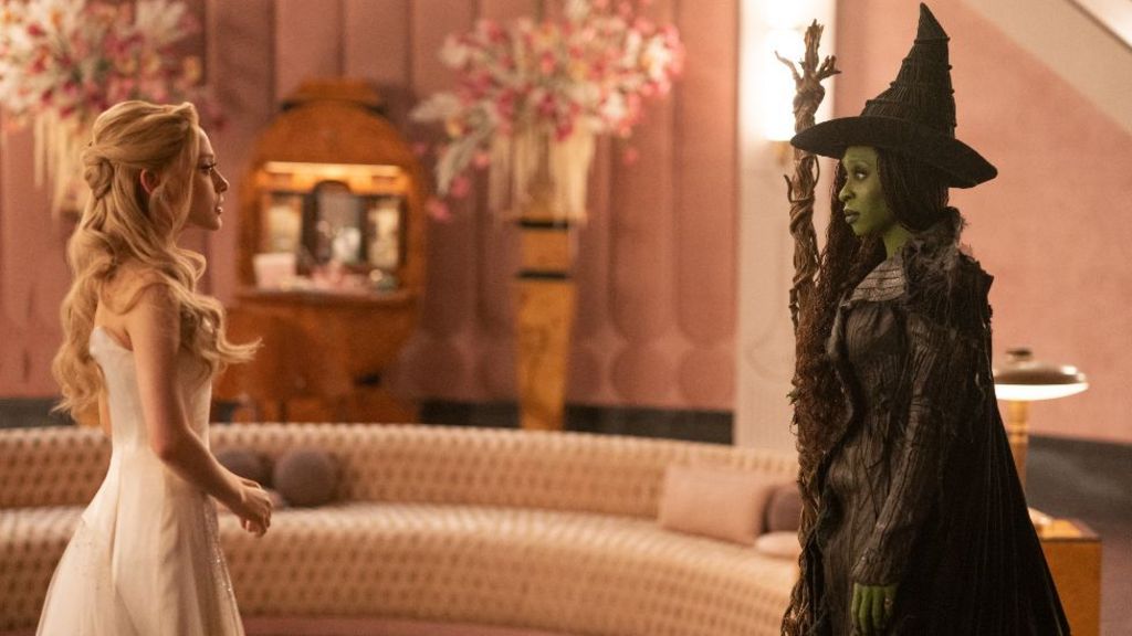 Ariana Grande and Cynthia Erivo in Wicked, standing opposite each other