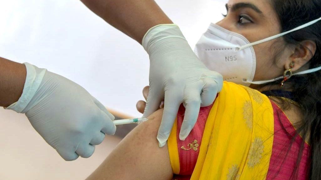 A volunteer receives the Covid-19 vaccine at a mock run in India's Karnataka