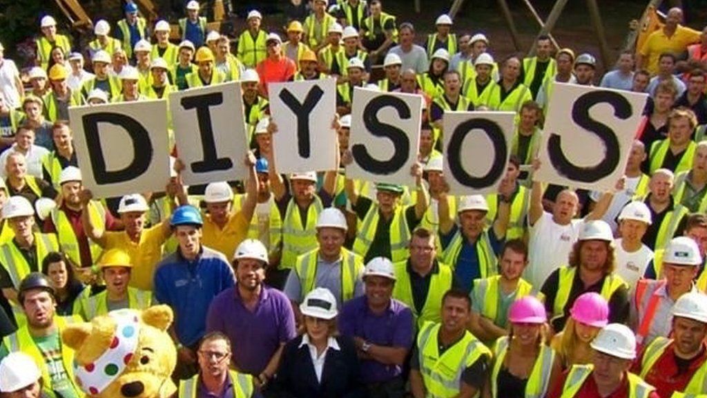 Builders and charity workers in hi-vis
