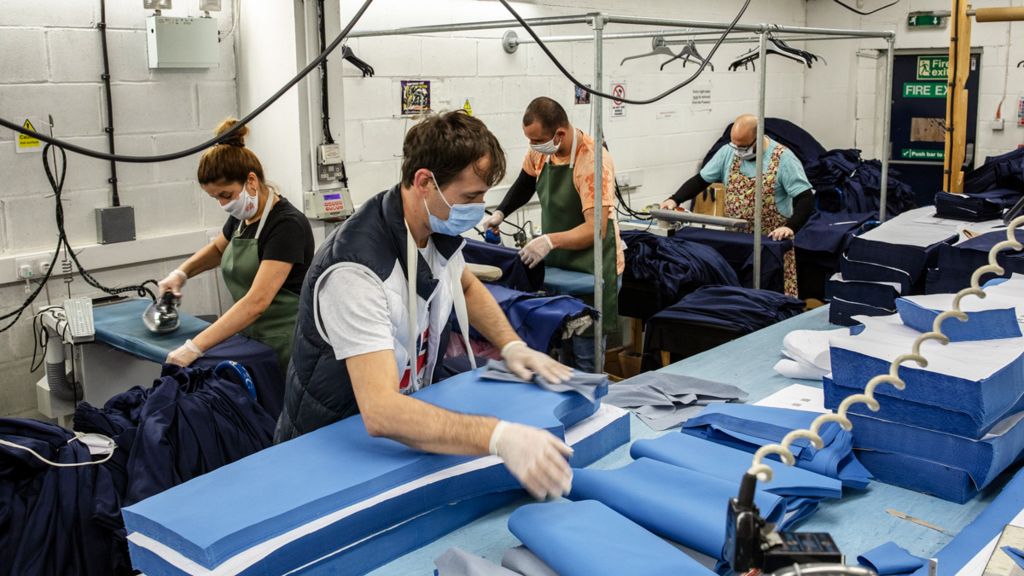 Employees at 'Fashion Enter' in London make scrubs for NHS staff on April 24 2020