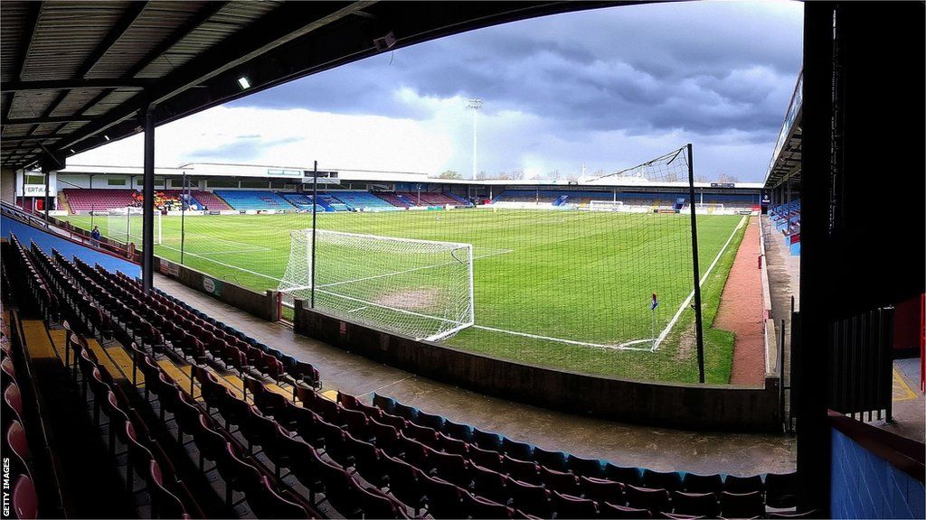 Scunthorpe United's Glanford Park view from behind the goal of the net and the pitch