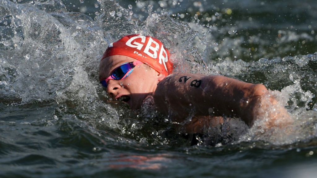 Britain's Hector Pardoe swims in the Seine