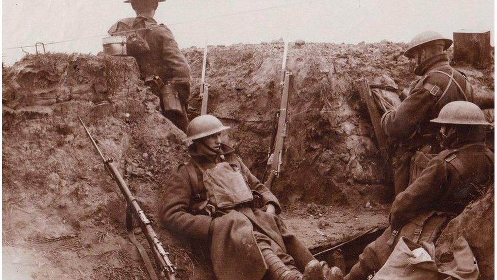 Soldiers of the Royal Welch Fusiliers pose for a photograph in their trench