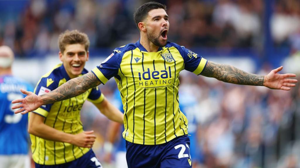 Alex Mowatt of West Bromwich Albion celebrates scoring during the Championship match at Portsmouth FC.