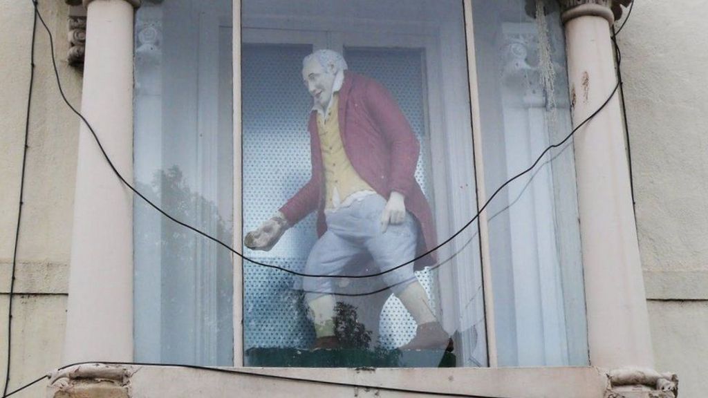 Old General statue in window