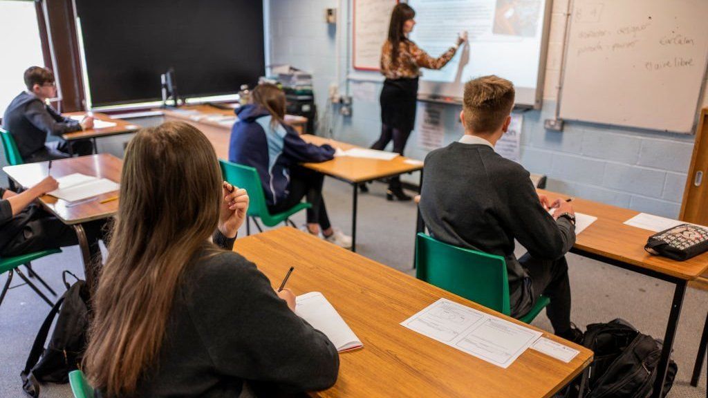 Secondary school pupils in a socially distanced lesson