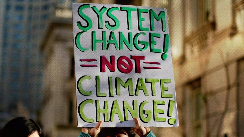 "system change not climate change"