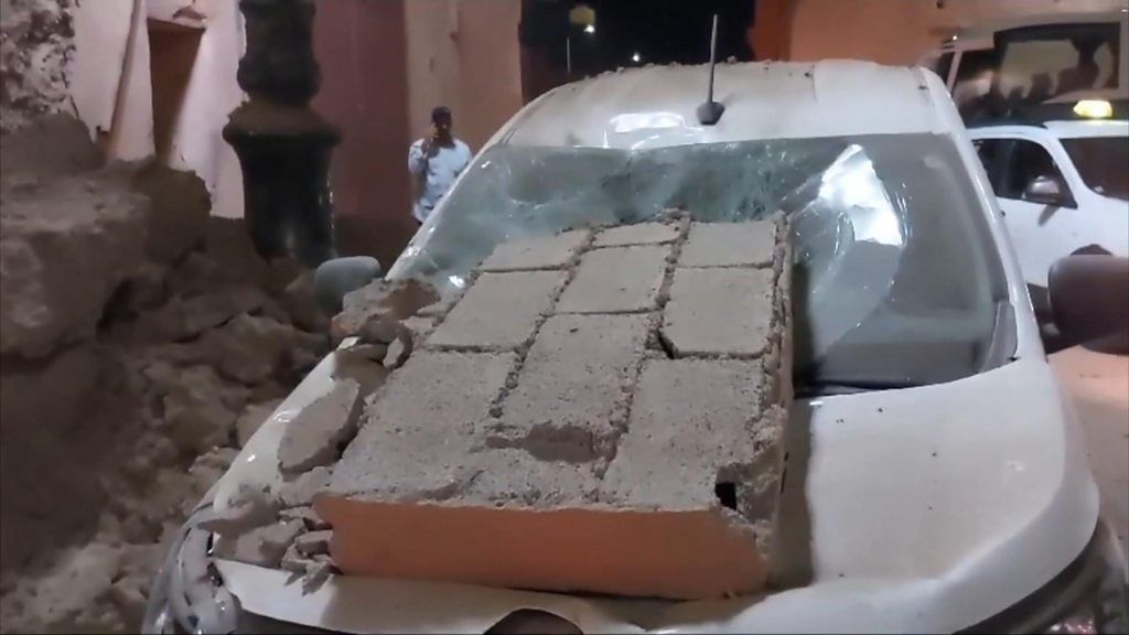 Debris falls on car after deadly earthquake in Morocco