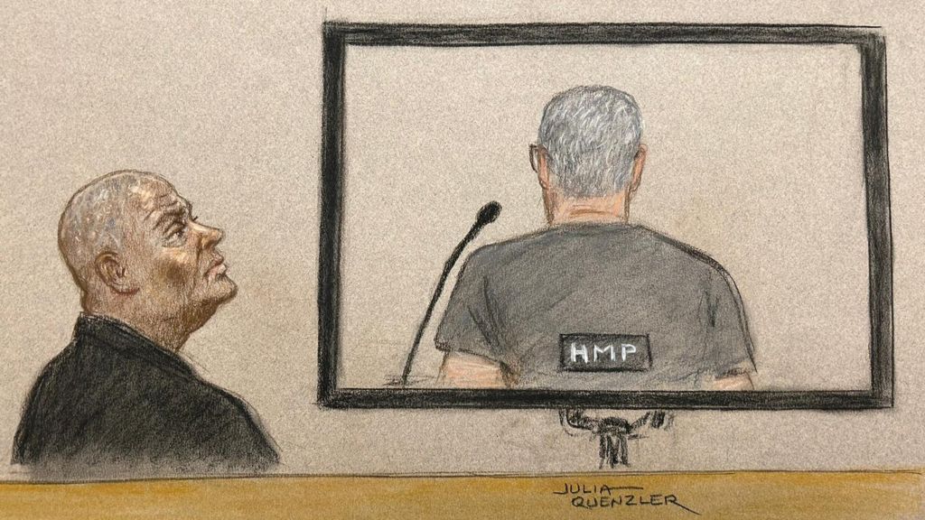  Doreen Lawrence looking at the back of David Norris, who was appearing via video link during parole hearing at Royal Courts of Justice in central London