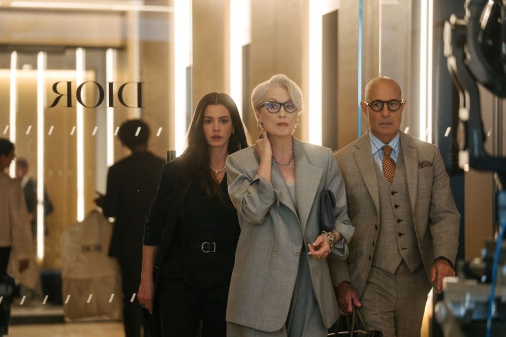 Still from The Devil Wears Prada 2 of Anne Hathaway, Meryl Streep and Stanley Tucci