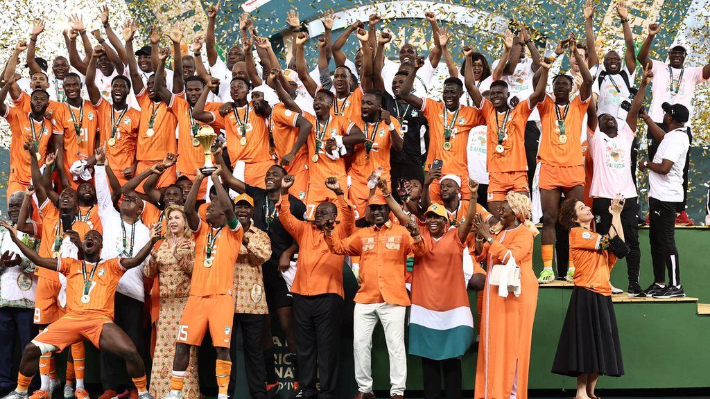 Ivory Coast players celebrate with the 2023 Africa Cup of Nations trophy