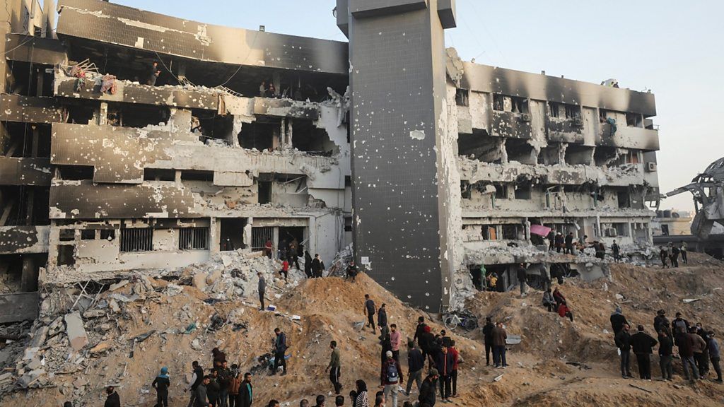 Palestinians inspect damages at al-Shifa hospital