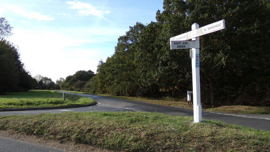 Signpost on country lane