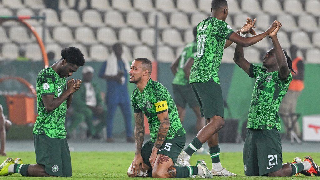 Nigeria celebrate beating South Africa on penalties