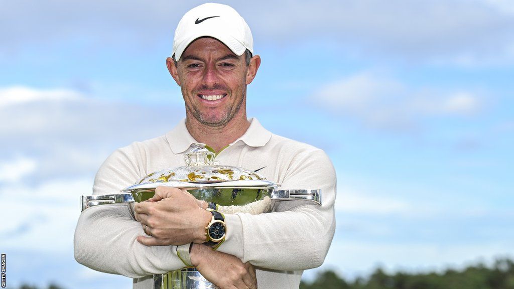 Rory McIlroy poses with the Scottish Open trophy