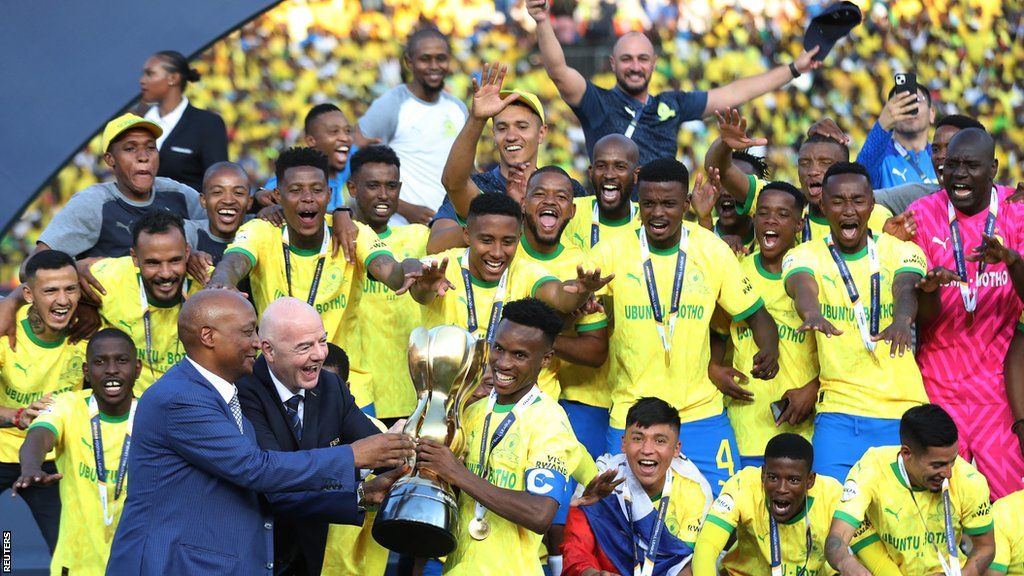 Mamelodi Sundowns receive the African Football League trophy from Caf president Patrice Motsepe and Fifa president Gianni Infantino