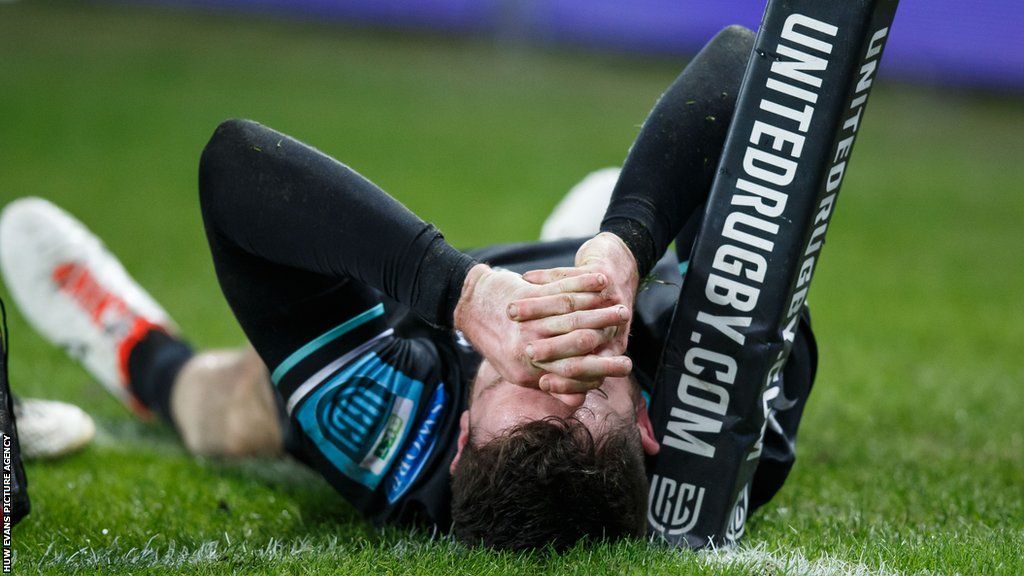Alex Cuthbert looks dejected after sustaining an injury