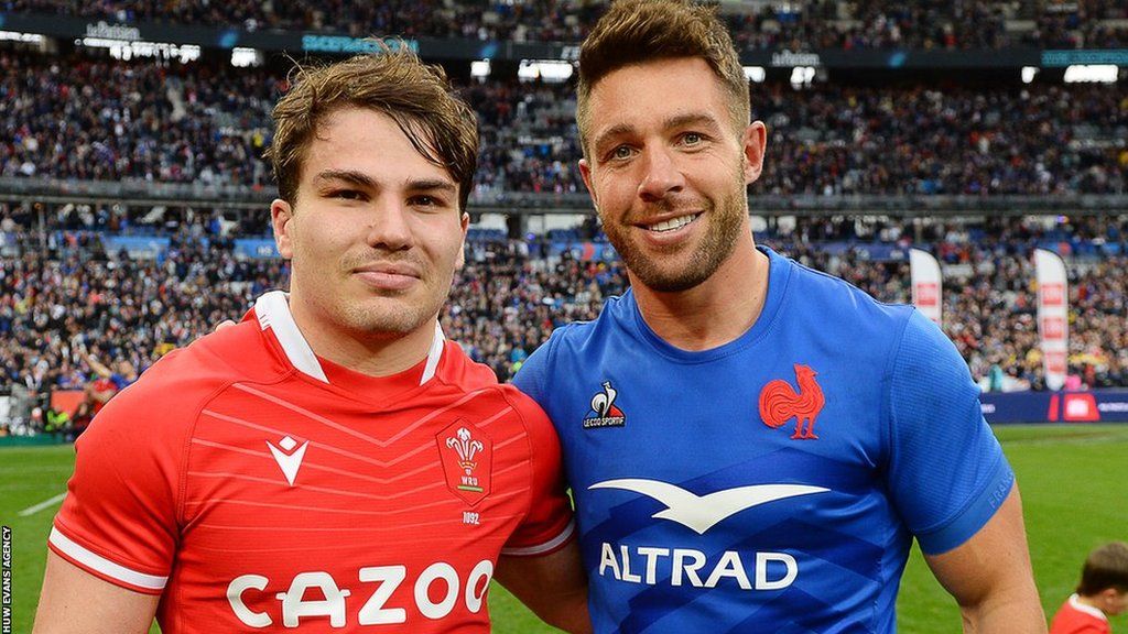 France's Antoine Dupont and Wales' Rhys Webb after swapping their jerseys in Paris